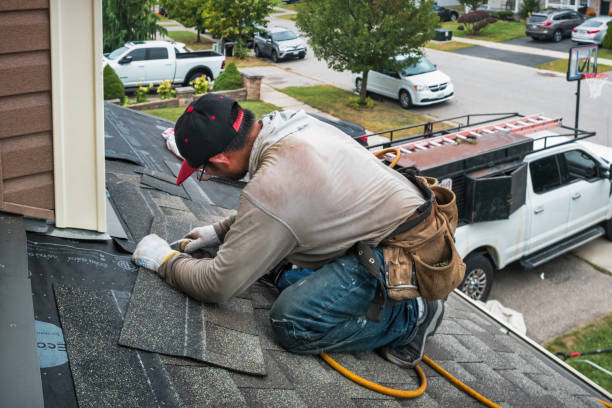 Professional Roofing technician working in Brookline, MA